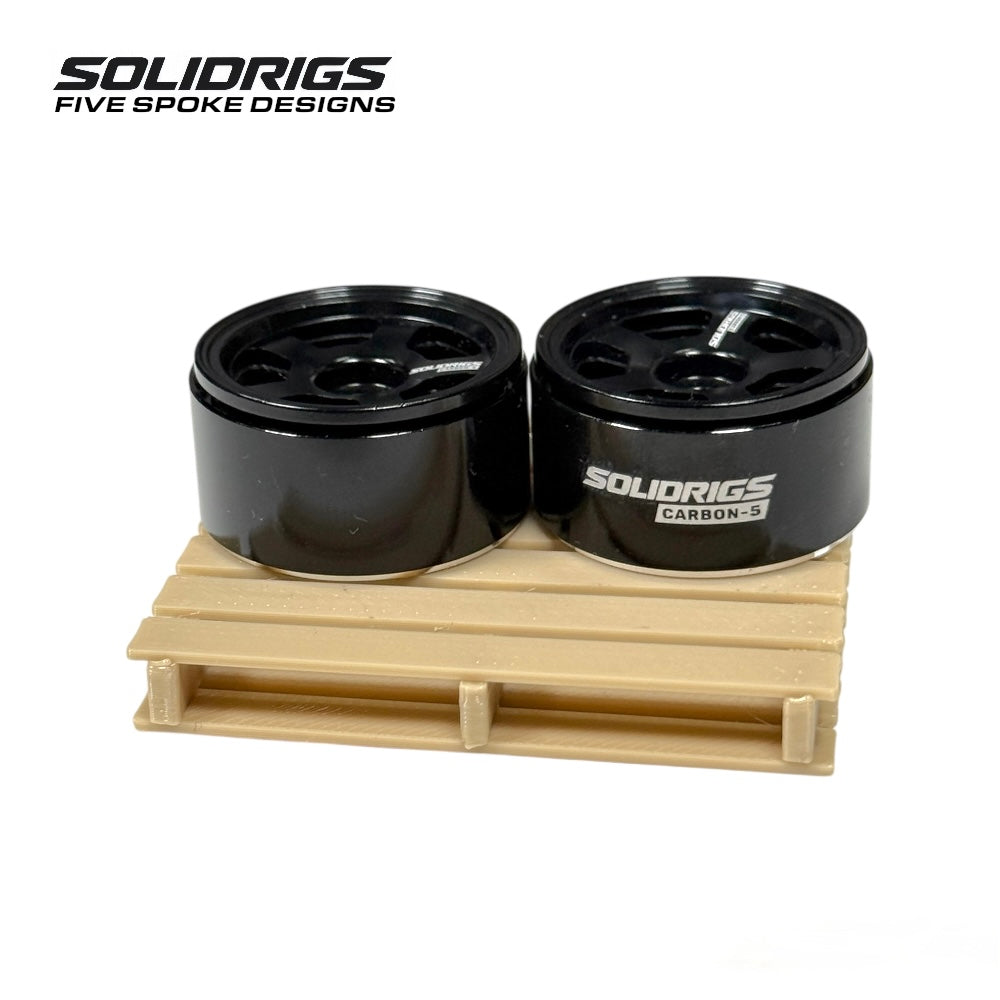 SolidRigs RC 5-spoke 1.0-inch beadlock wheels for SCX24 RC vehicles with durable black finish and detailed design.