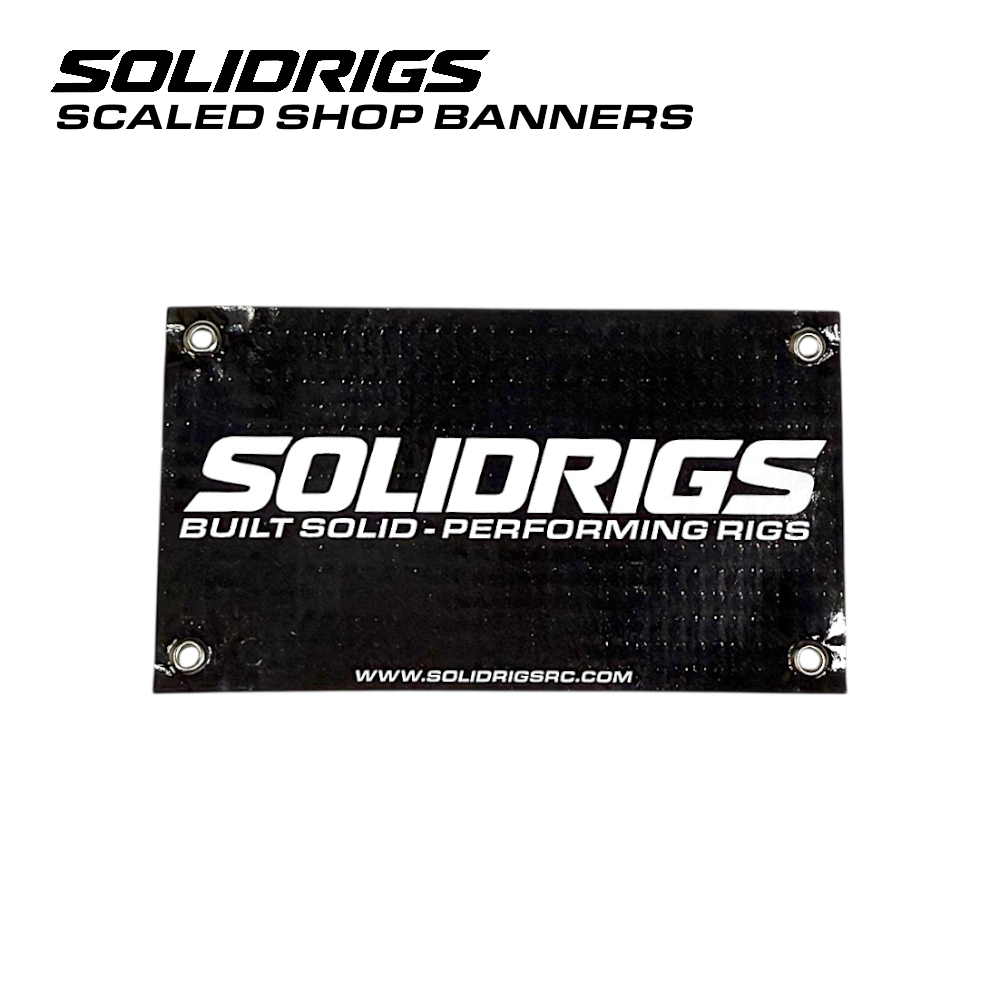 SOLIDRIGS RC Scale Garage banner, 4 x 2.5 inches, featuring bold graphics and branding for RC enthusiasts.