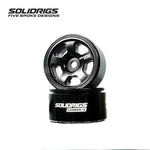 Solidrigs RC 5-spoke 1.0-inch beadlock wheels for SCX24 RC trucks, showing black metal finish and beadlock design.