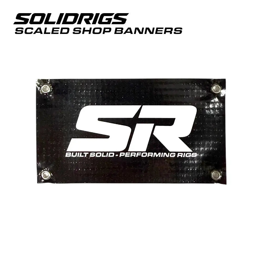 SolidRigs RC Scale Garage banner, 4x2.5 inches, featuring the branded scaled banner design with bold logo and colorful graphics.
